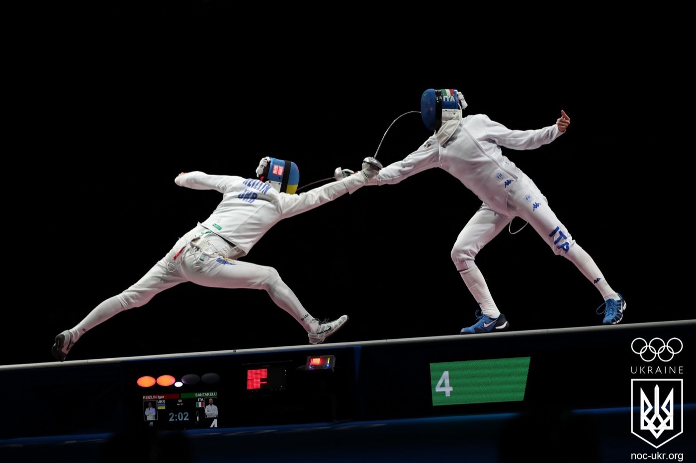 Igor Reizlin of Ukraine and Andrea Santarelli of Italy fencing in the men's epee bronze medal bout at the Tokyo 2020 Olympics