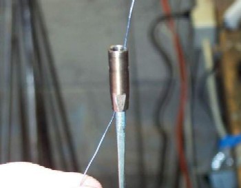 Threading the wire threading a wire through the foil barrel