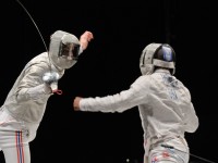 Tim Morehouse fences Daryl Homer
