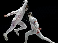 Ace Eldeib in action against Poland's Majgier in the Cadet Men's Epee event.