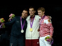 Diego Occhiuzzi (ITA), Aron Szilagyi (HUN), and Nikolay Kovalev (RUS) on the medal stand.
