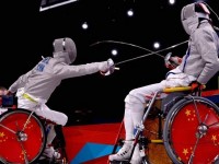 Chen Yijun (CHN) and Tian Jianquan (CHN) compete in the men's Individual Sabre Wheelchair Fencing - Category A final on Day 8 of the London 2012 Paralympic Games at ExCeL.