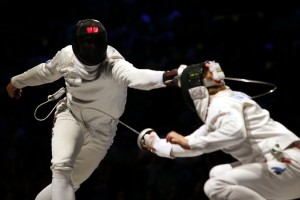 Novosjolov (EST) vs Limardo (VEN) at the 2013 Mens Epee World Championships match in Budapest. Photo STimacheff/FencingPhotos.com