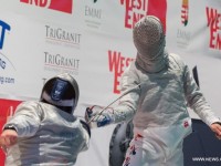Aron Szilagyi (left) faces Junghwan Kim (right) (photo: http://www.globaltimes.cn/content/847306.shtml)